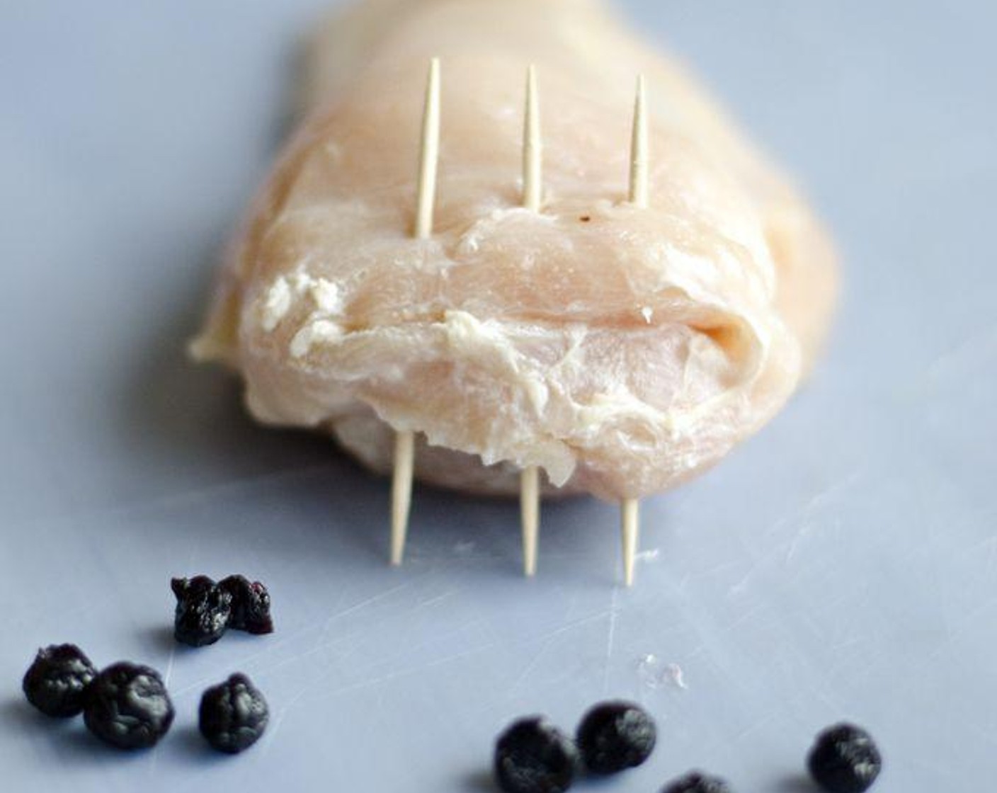 step 3 Divide mixture into 4 parts and stuff each breast with filling. Seal each pocket with a few toothpicks.