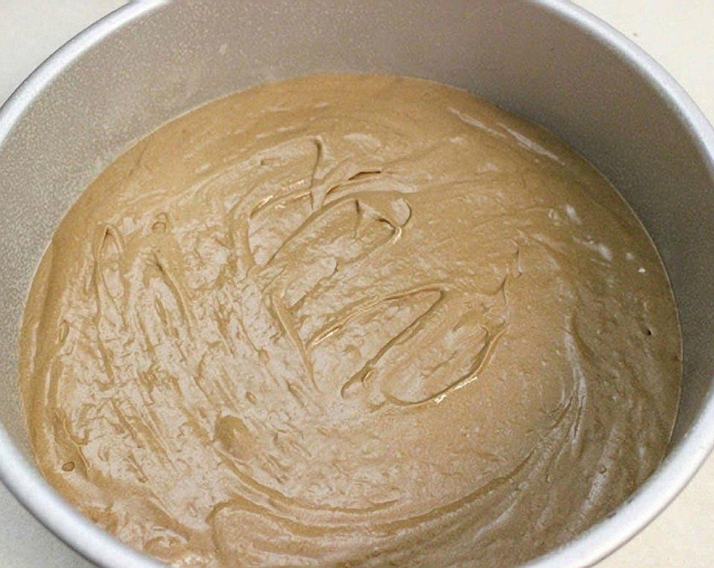 step 14 Pour 1/3 of the batter into the prepared cake pan.