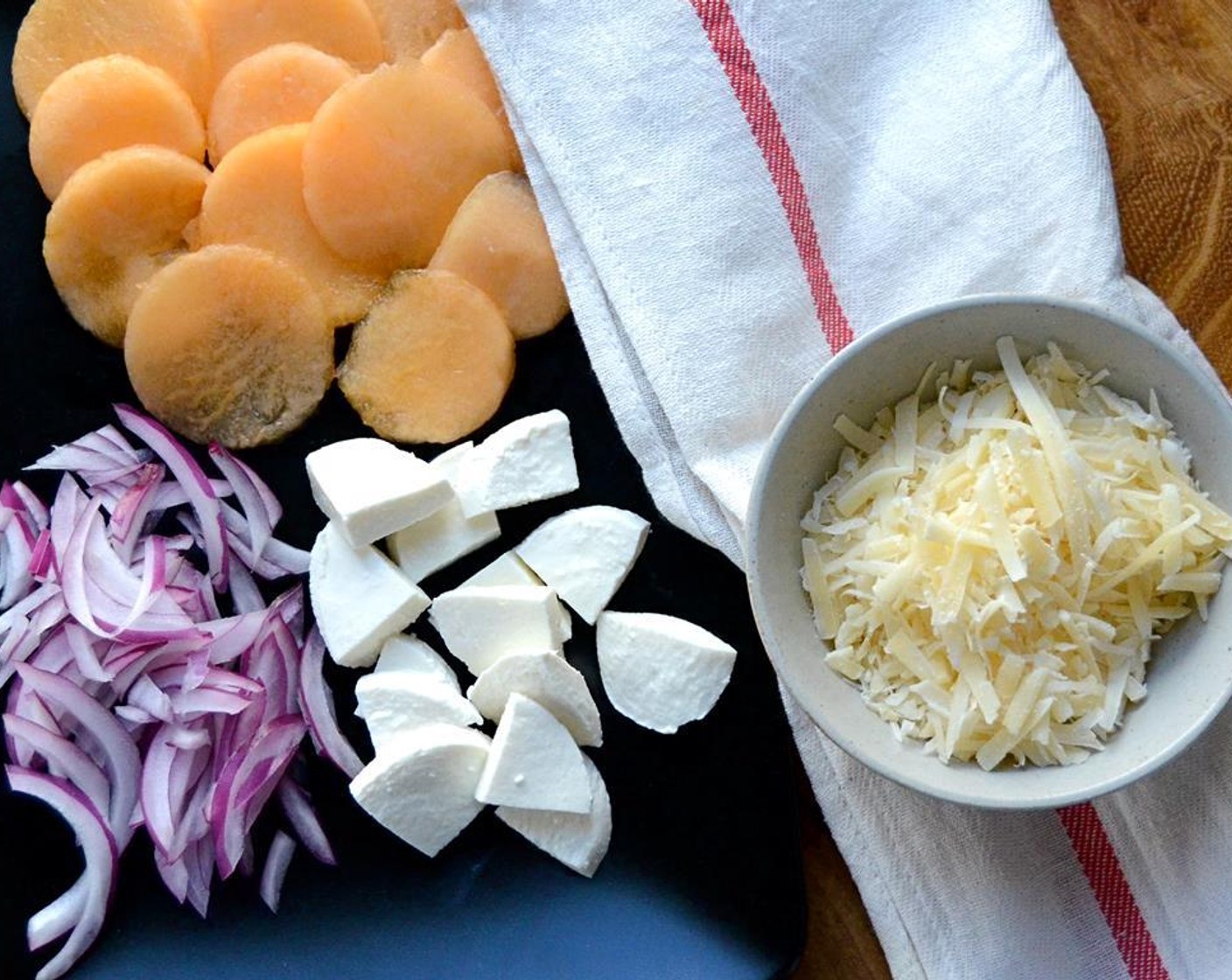 step 15 Assemble these ingredients by the grill: pizza dough, olive oil (and pastry brush), pancetta, cantaloupe, Mozzarella Cheese (4 cups), Red Onion (1/4), Parmesan Cheese (1 cup).