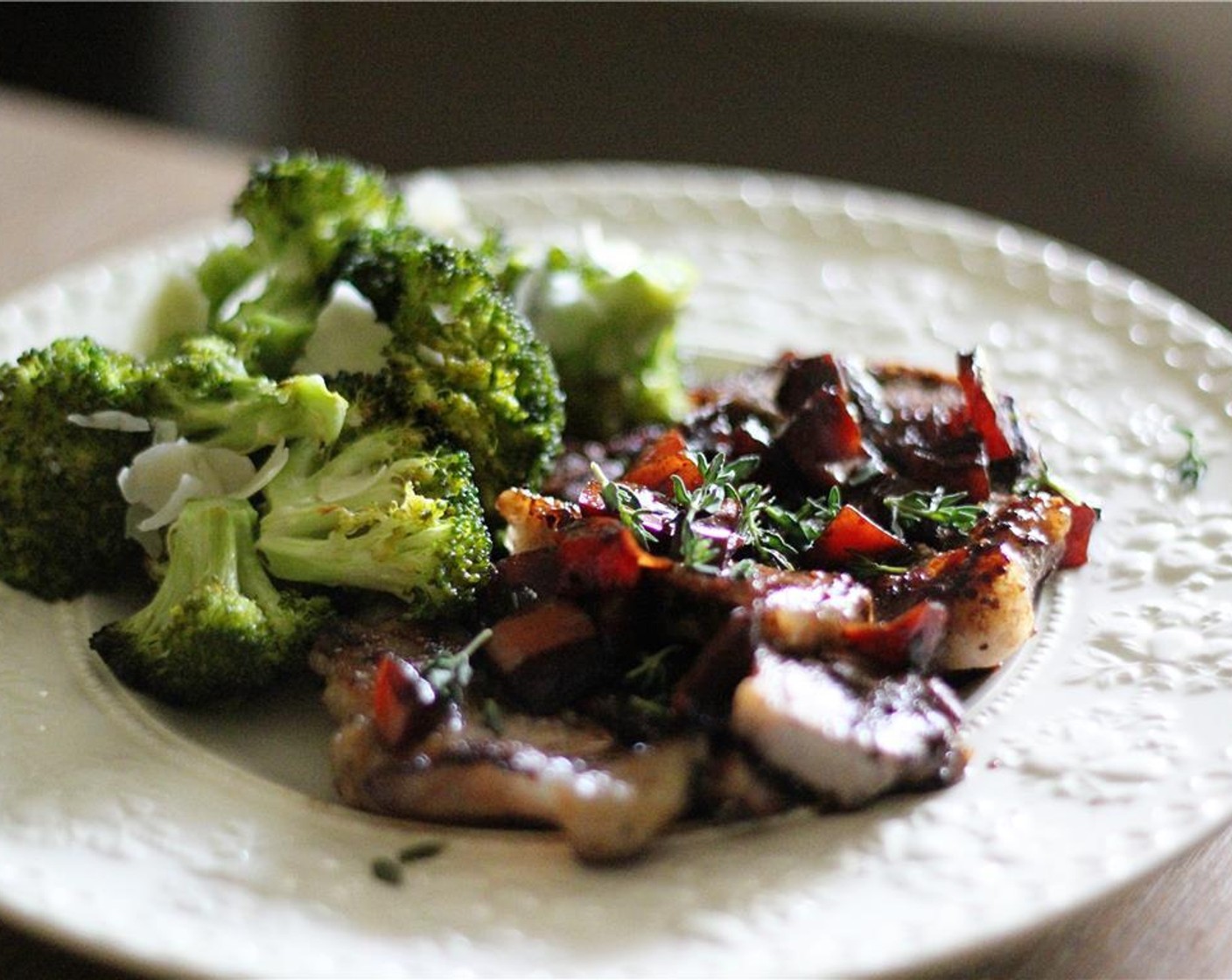 step 8 Serve each steak topped with the balsamic tomato mixture and side of Parmesan roasted broccoli.