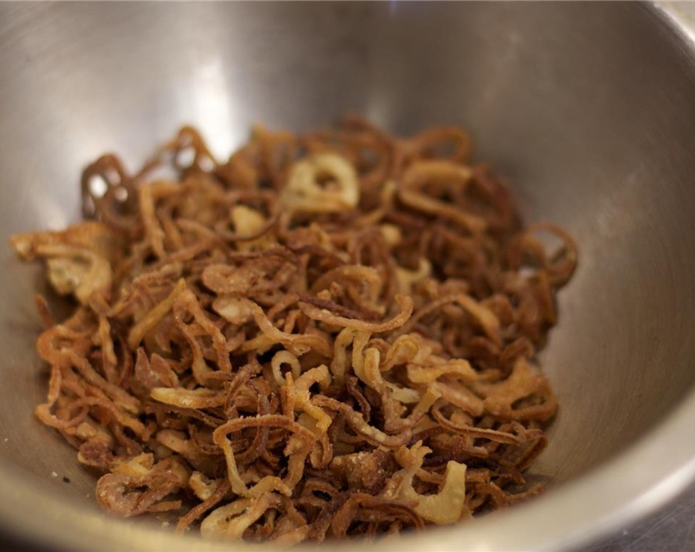 step 1 Thinly slice the Shallot (1) and fry in a deep fryer or large pot with Frying Oil (as needed) at 350 degrees F (180 degrees C) until golden brown. Remove and let dry on a paper towel-lined plate.