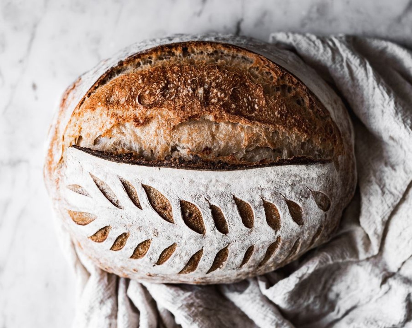 step 32 When first loaf is done baking re-heat oven to 500 degrees F (260 degrees C) and heat the covered dutch oven for 30 minutes at 500 degrees F before baking the second loaf as per instructions above.