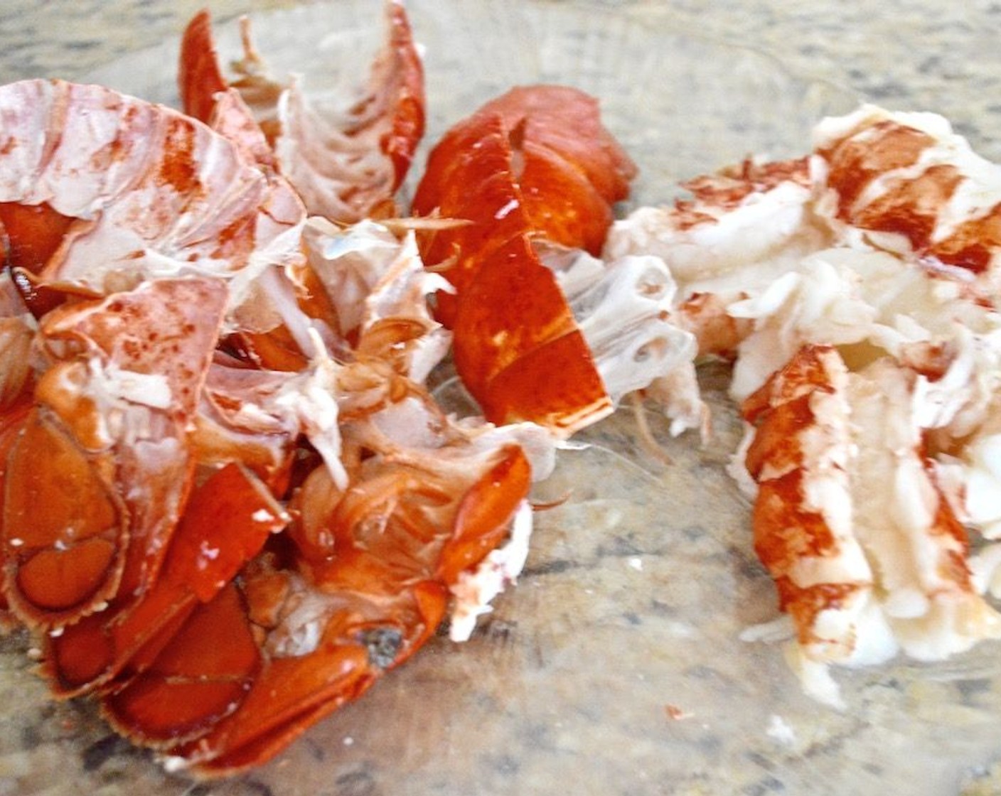 step 2 Pour the salty lobster cooking water into a heat proof bowl or container to reserve it. Then crack the tails open and remove the meat, trying not to break the tails too much into little pieces. Chop up the meat into tiny pieces and store it in the refrigerator while the soup cooks.