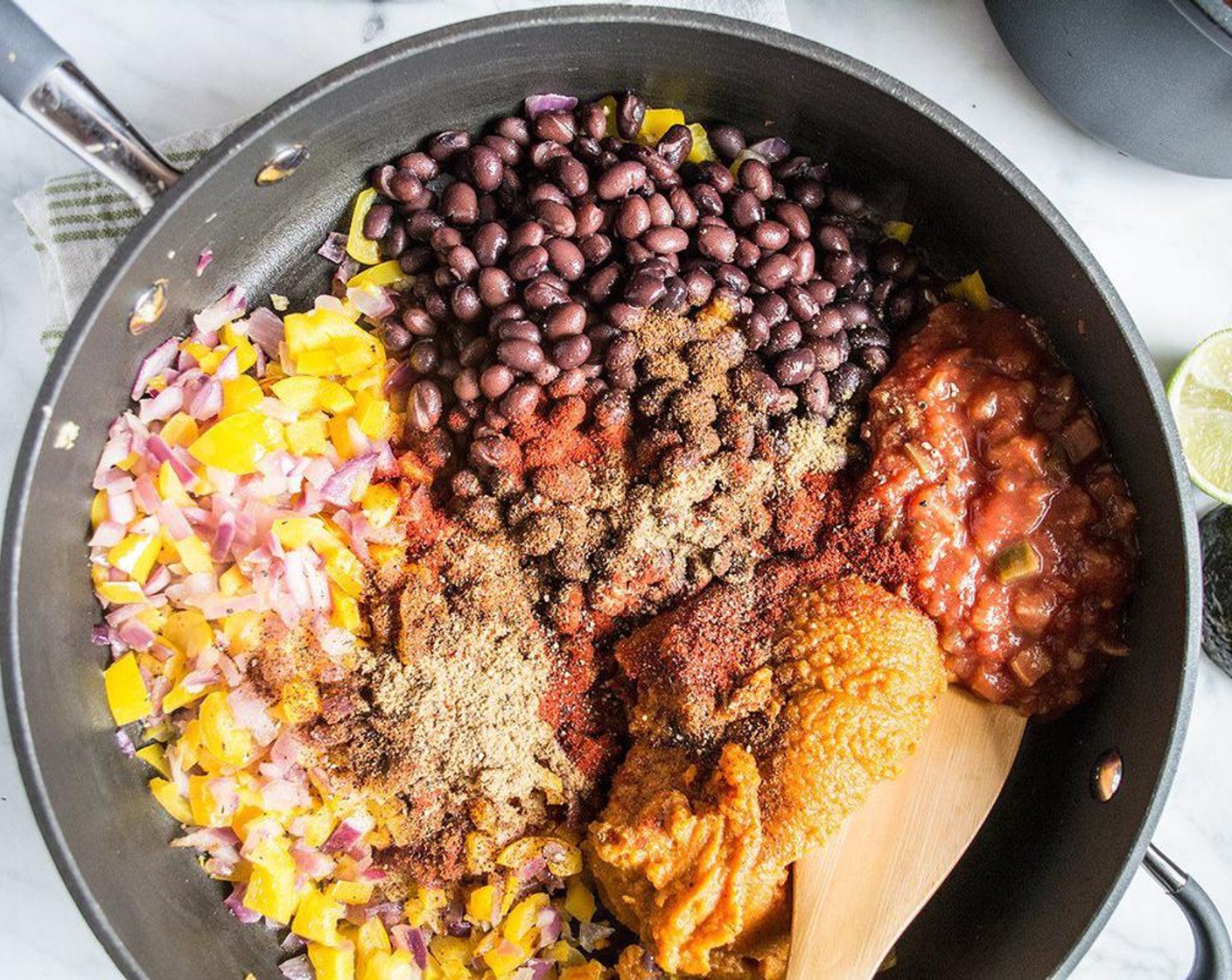 step 3 Add Black Beans (1 can), Canned Pumpkin Purée (1 cup), Mild Salsa (3/4 cup), Chili Powder (1/2 Tbsp), Ground Cumin (1 tsp), Smoked Paprika (1 tsp), and Ground Black Pepper (1/4 tsp), then stir to combine.