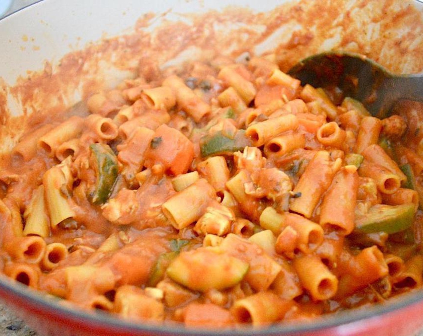 step 4 Give the whole sauce a big stir and let it simmer for 15 minutes. When the 15 minutes is up, add in the Rigatoni (1 lb) and stir it in to submerge in the sauce. Let the pasta cook until tender for 8-10 minutes, stirring often.