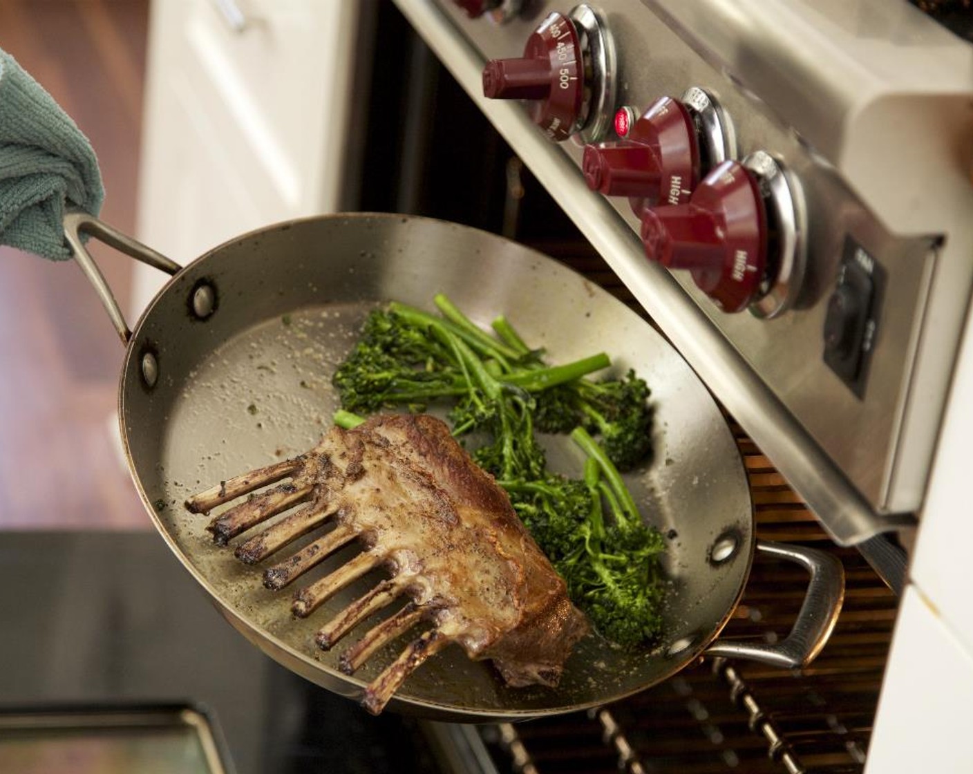 step 11 Return the lamb to the pan and place in the oven to roast for 8 to 10 minutes. Remove from oven and let rest.