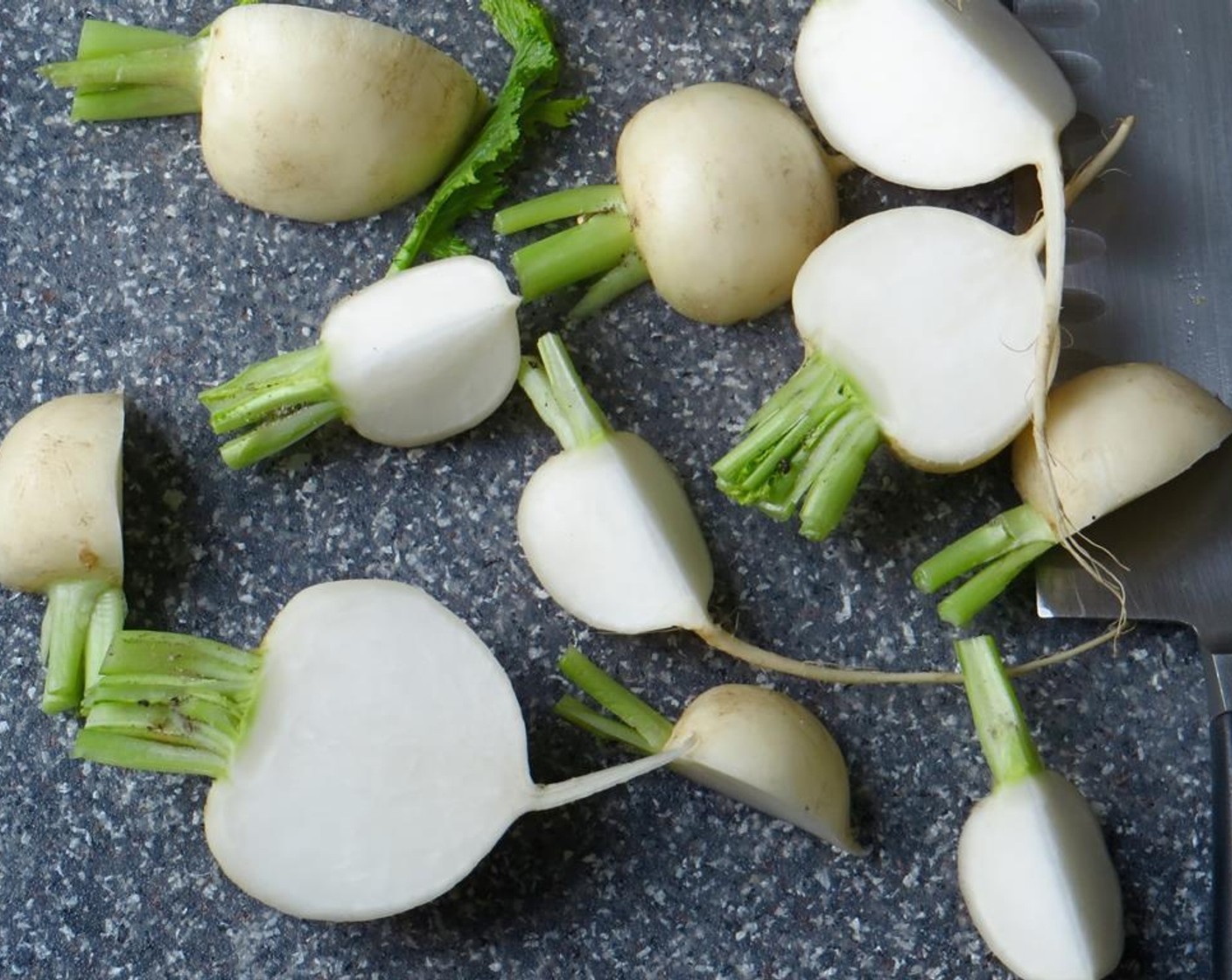 step 3 Rinse turnips (check the stems where sand collects) and cut into quarters.