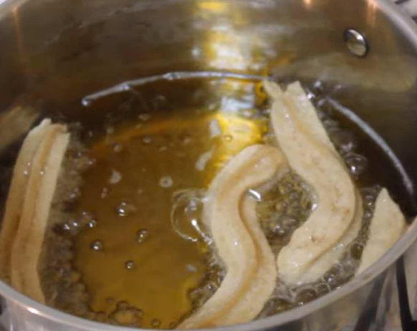 step 3 Heat a pan with Frying Oil (as needed). Fill a piping bag with the batter, then start piping 5-inch strips of batter into the hot oil. Fry for about 3-4 minutes. Make sure not to overcrowd the pan. Drain on a paper towel.