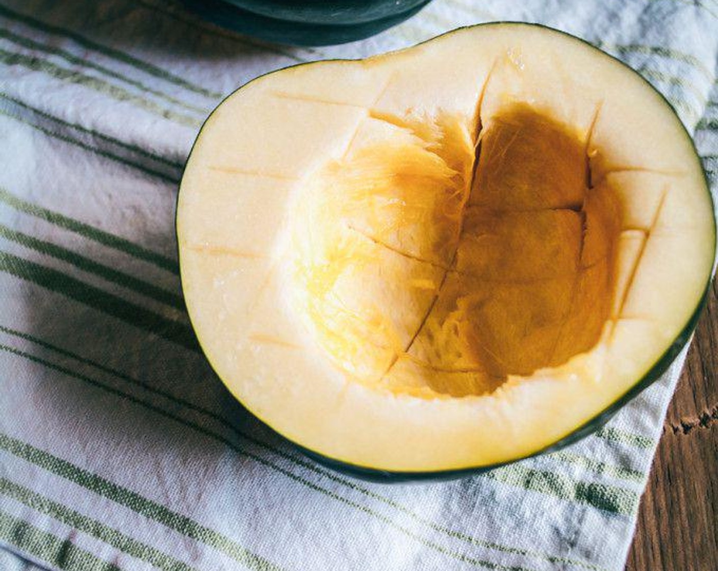 step 6 Once the squash has cooked, allow to cool, then scrape the flesh out (should be in chunks from scoring the flesh) of each half, leaving a thin layer in skin for stability.