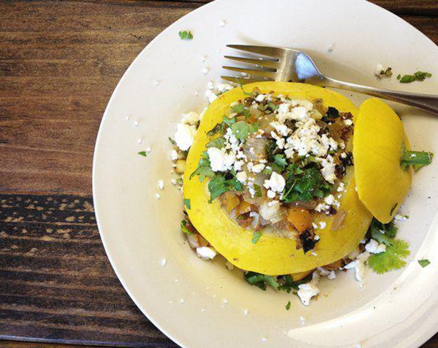 step 6 Once Stuffed Squash have cooked, remove from oven and add Fresh Herbs (to taste) and Feta Cheese (2 Tbsp).