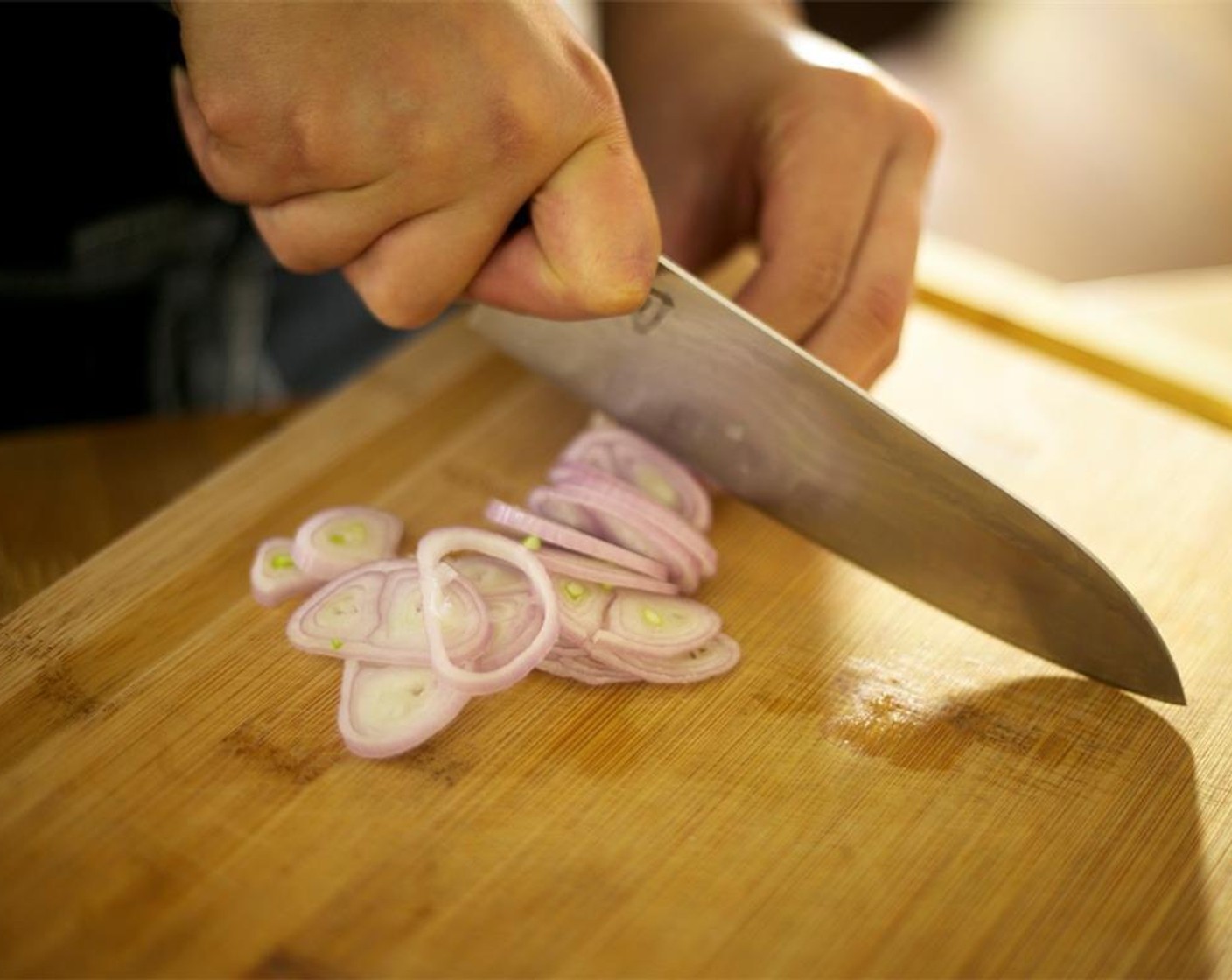 step 2 Slice Shallots (2) into thin rings and set aside.