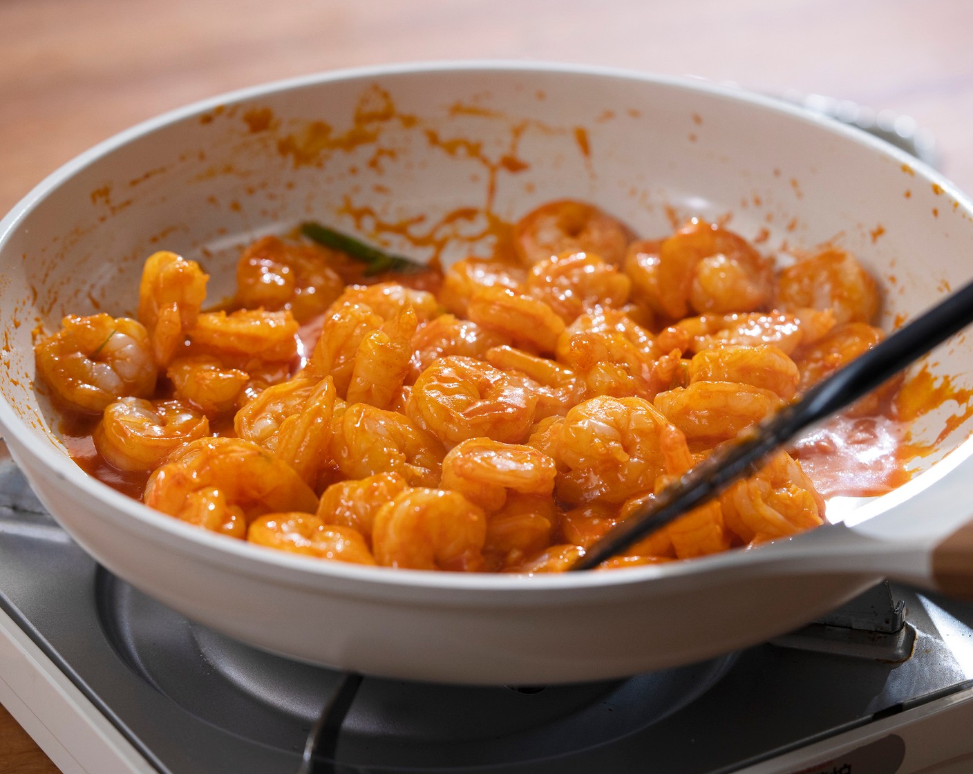 step 3 Add Shrimp (1 lb) and gochujang mixture. Cook for 2-3 minutes or until the shrimps are opaque. Stir occasionally.