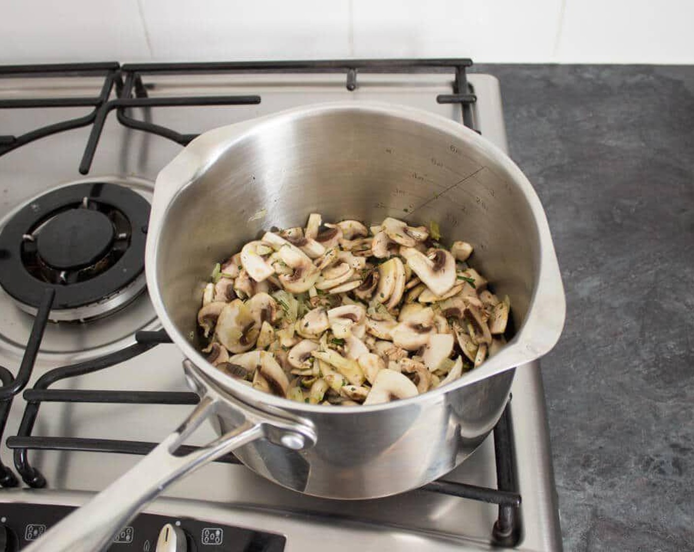 step 3 Heat the saucepan over a medium heat then add the Olive Oil (1 Tbsp). Add the Onion (1) then fry for a few minutes until softened. Add the Fresh Rosemary (1 sprig) and Mushrooms (2 1/2 cups) fry for a minute or two.