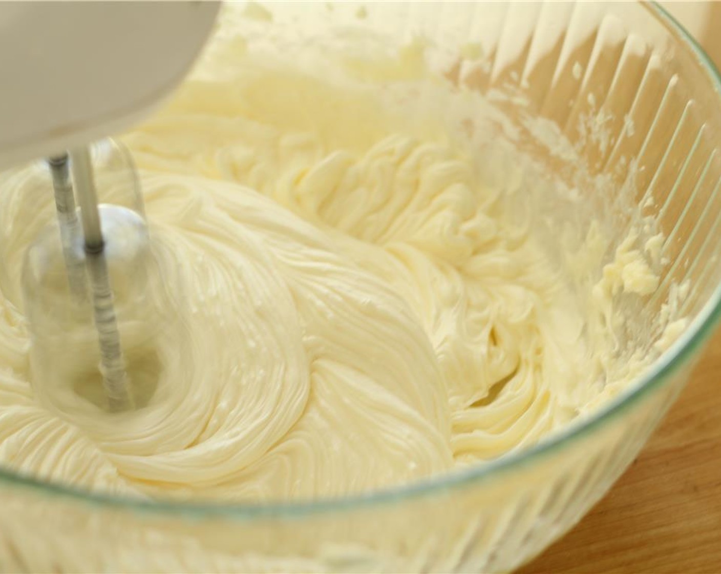 step 6 Cream the Unsalted Butter (1 cup) and Powdered Confectioners Sugar (1 cup) together on high for 3 minutes, until fluffy and smooth.