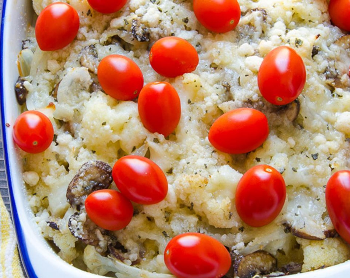 step 9 Remove the foil and dot the top of the gratin with Cherry Tomato (1 cup). Bake for an additional 15 to 20 minutes until tomatoes pop and slump.