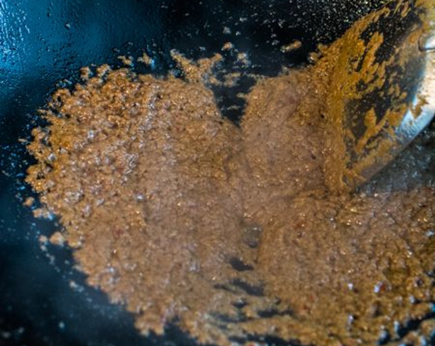 step 8 Heat Cooking Oil (4 Tbsp) over medium high heat. Stir-fry the sauce puree until the oil starts to rise to the top.