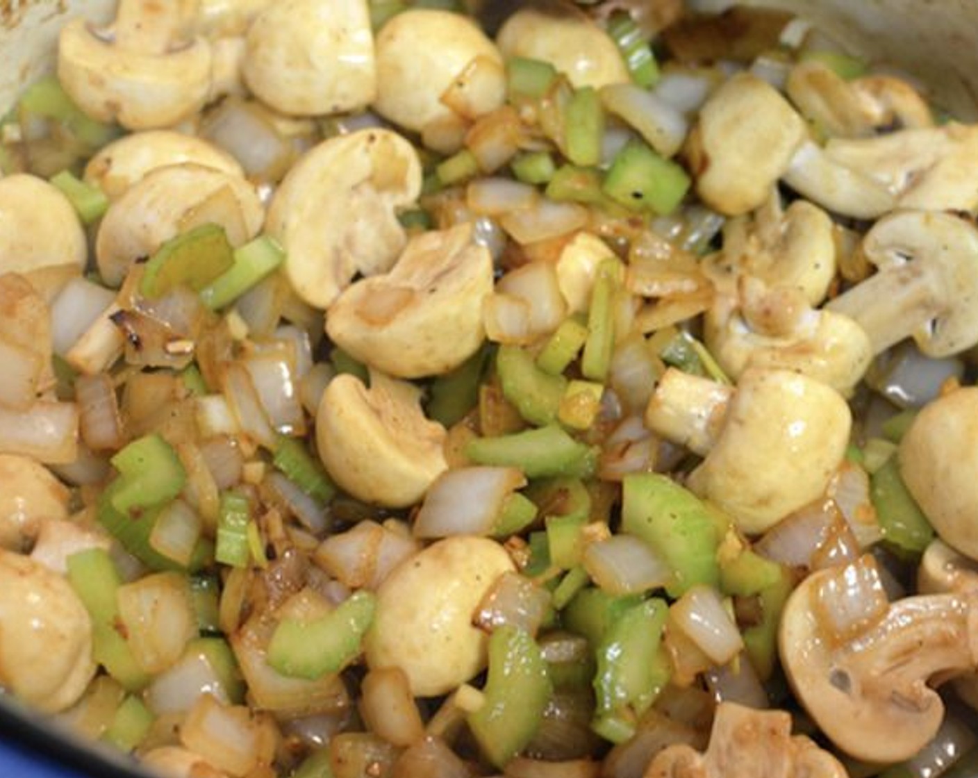 step 7 Add the chopped celery and mushrooms to the pot and sauté them for a couple minutes.