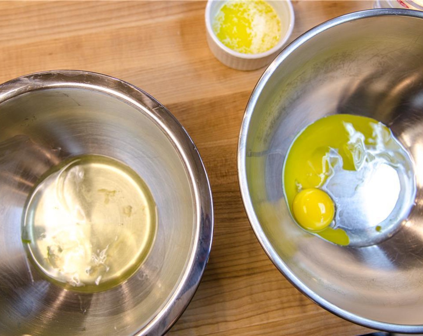 step 2 In a medium bowl, whisk yolks until thick and pale yellow.
