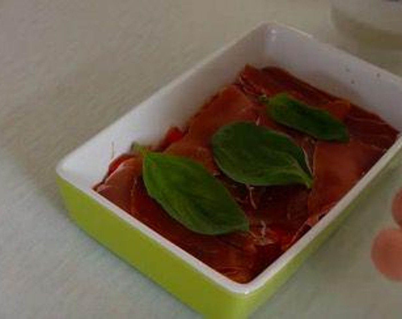 step 5 On top of the ham add a few leaves of Fresh Basil (1 handful) These can be whole leaves or if you prefer you can finely chop them and sprinkle them on top.