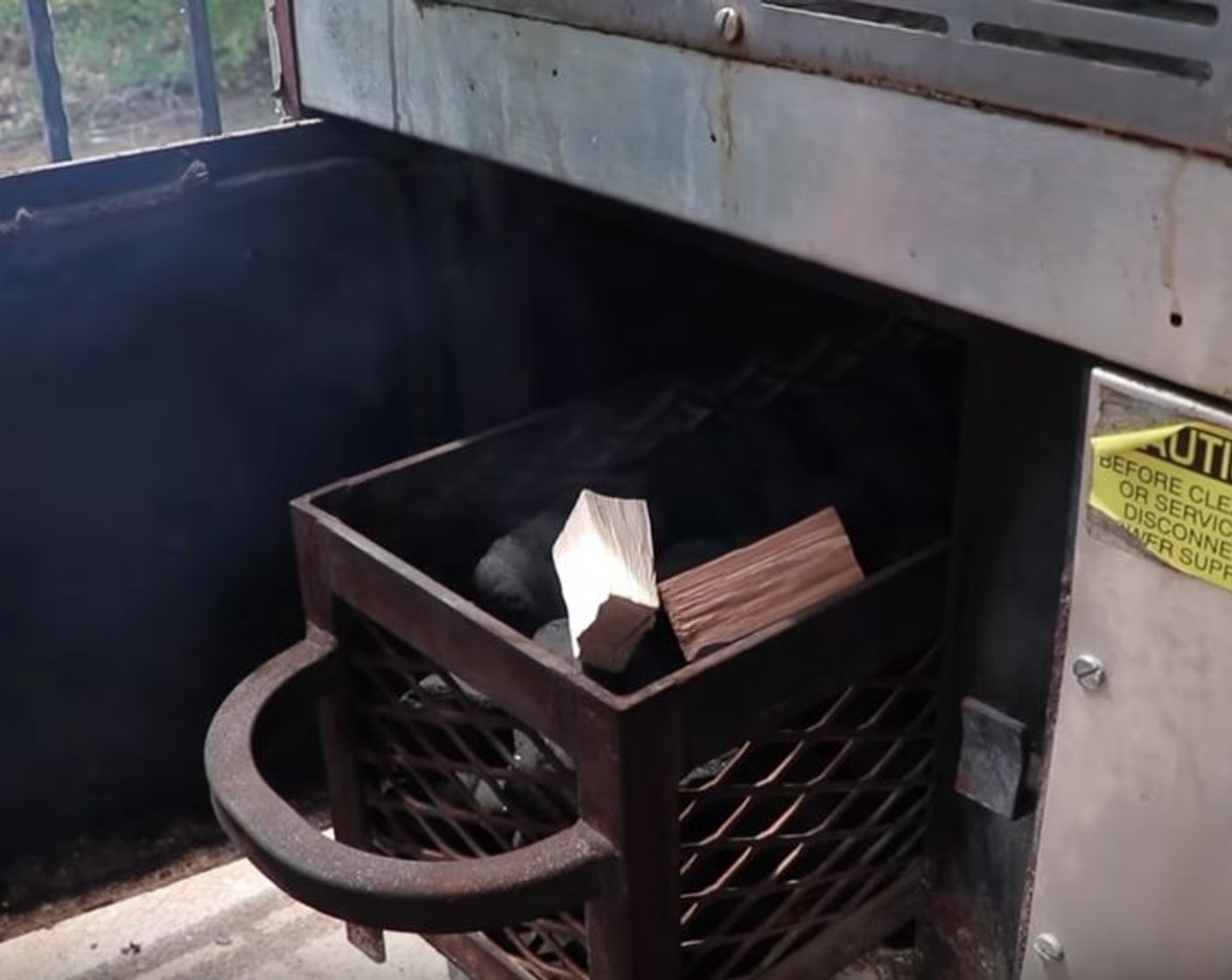 step 1 Prepare smoker for indirect cooking at 250 degrees F (121 degrees C). When smoker reaches optimal temperature, place chunks of hickory and pecan wood directly on hot coals for smoke flavor.