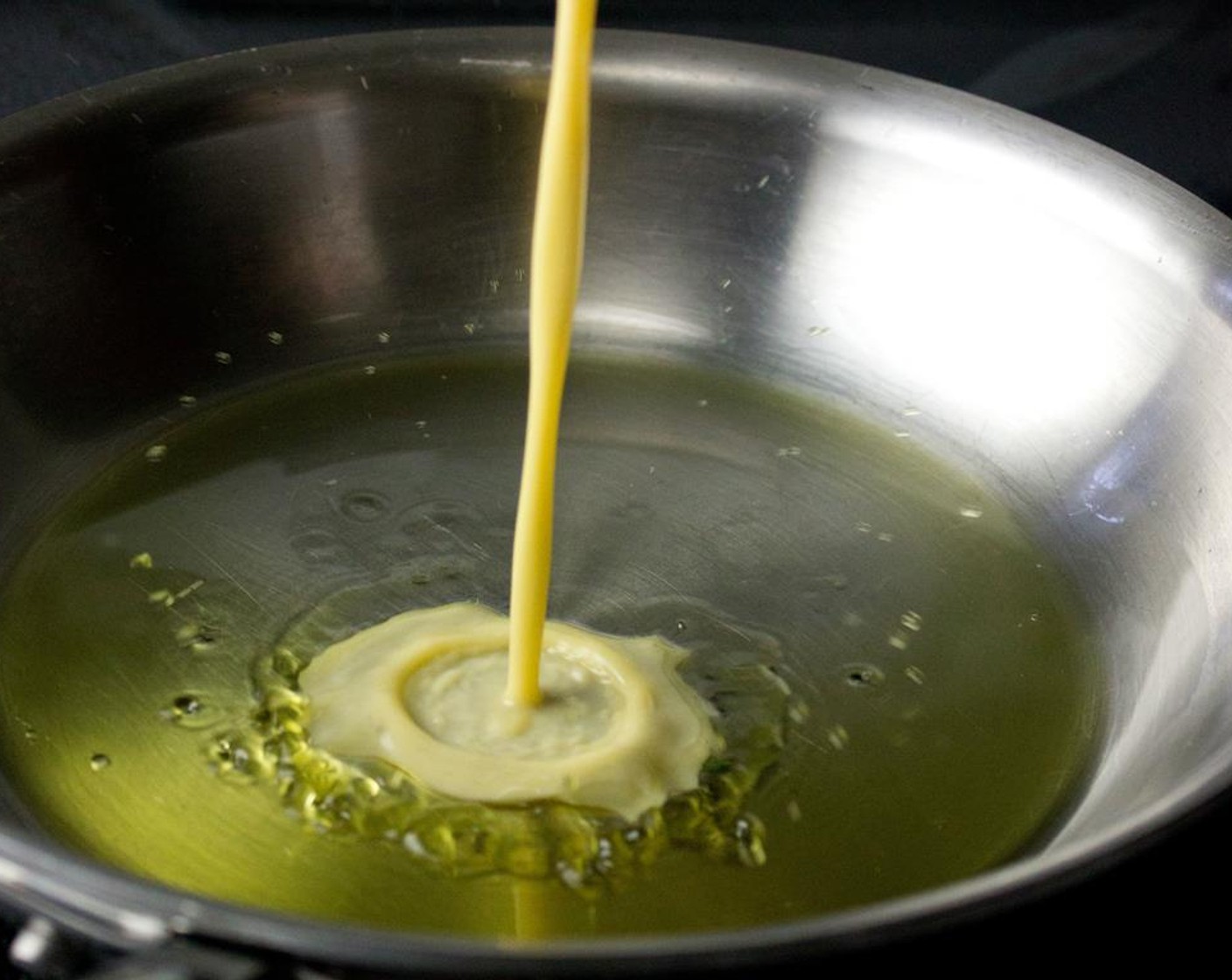 step 4 Heat a small saute pan to medium heat with enough Olive Oil (as needed) to coat the pan. Pour in the eggs and cook on the stovetop until it's set, but still liquid on top. Then finish cooking in the oven (will only take a minute or two).