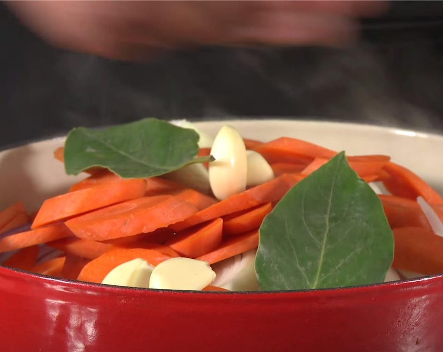 step 5 Add Carrots (4), Garlic (6 cloves), Bay Leaves (2), Fresh Thyme (4 sprigs), and Tomato Paste (1 Tbsp).