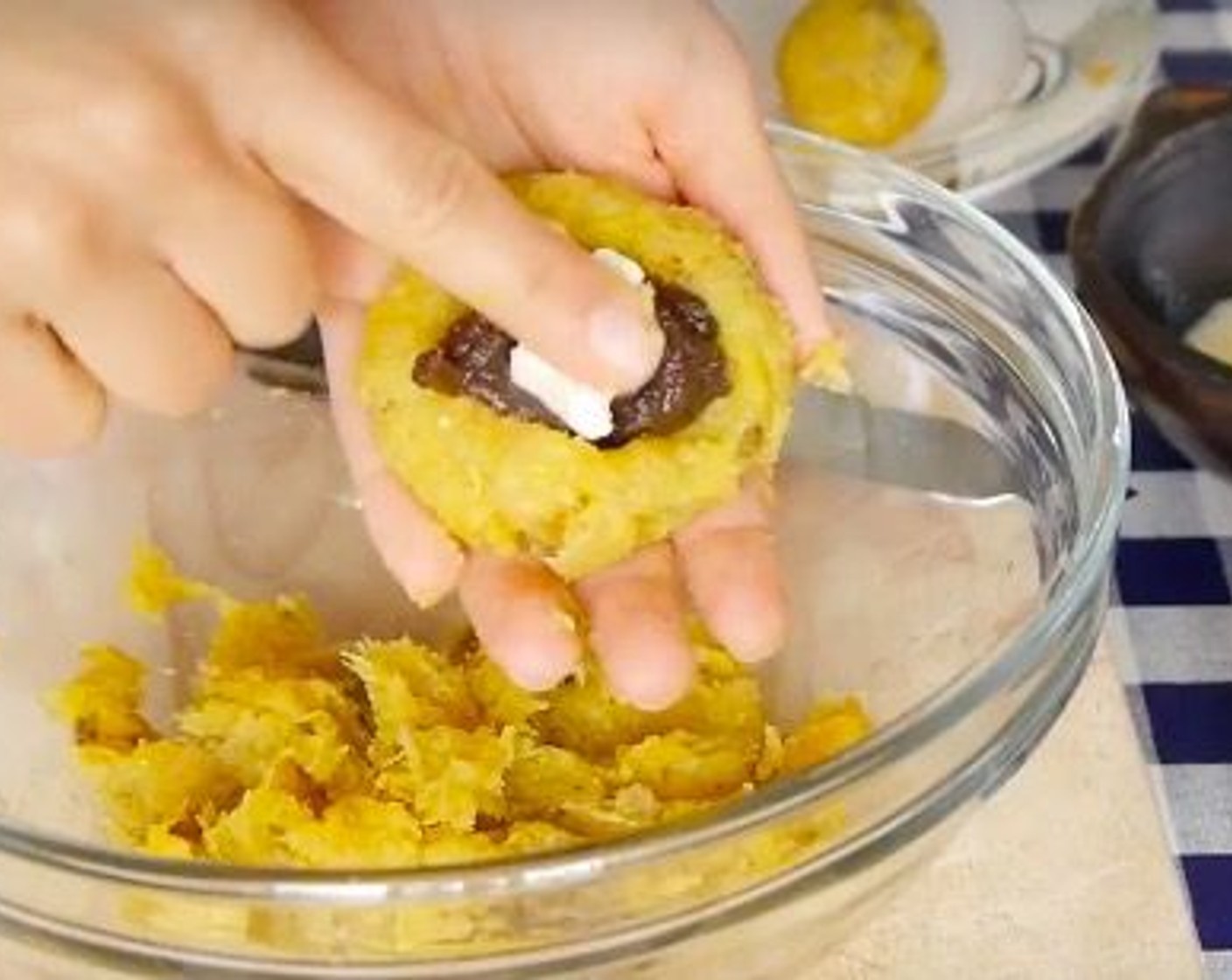 step 7 I made my balls by mixing the Feta Cheese (to taste), Ground Beef (to taste), Canned Black Beans (to taste), putting 2 types of filling on each ball. But you can also make them with just one filling.