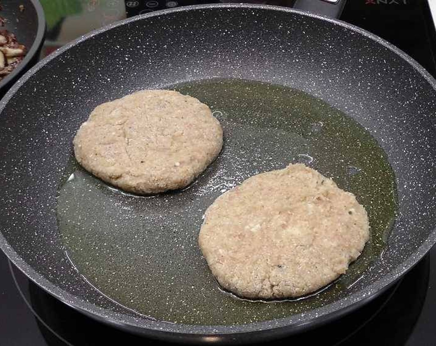 step 4 Heat up some Olive Oil (as needed) in a pan and fry the patties until they are cooked through.