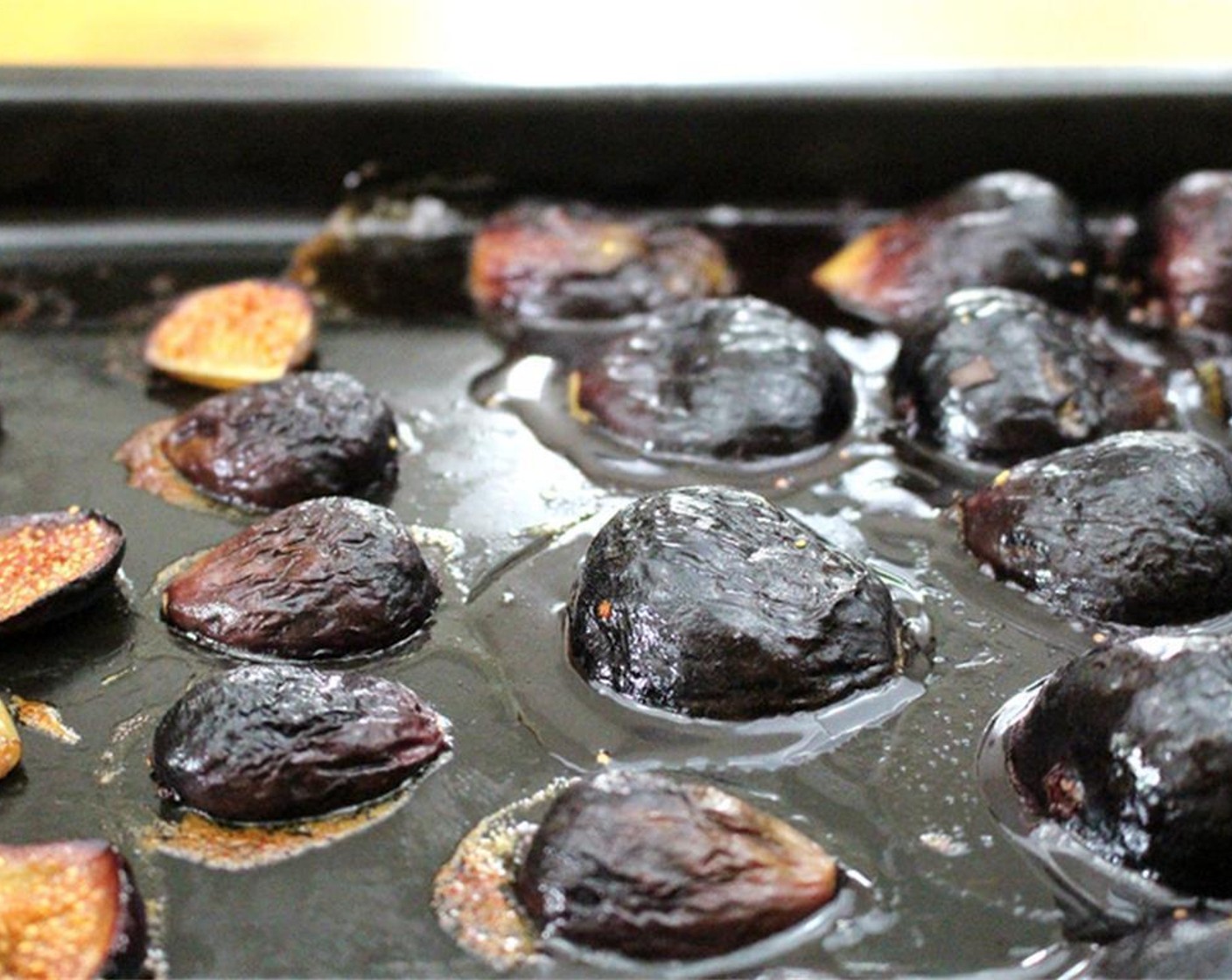 step 4 Flip sliced figs. Leave halved ones cut side down, and roast for about 5 to 10 minutes more. Remove from pan and cool. Scrape fig flesh from skin and set aside.