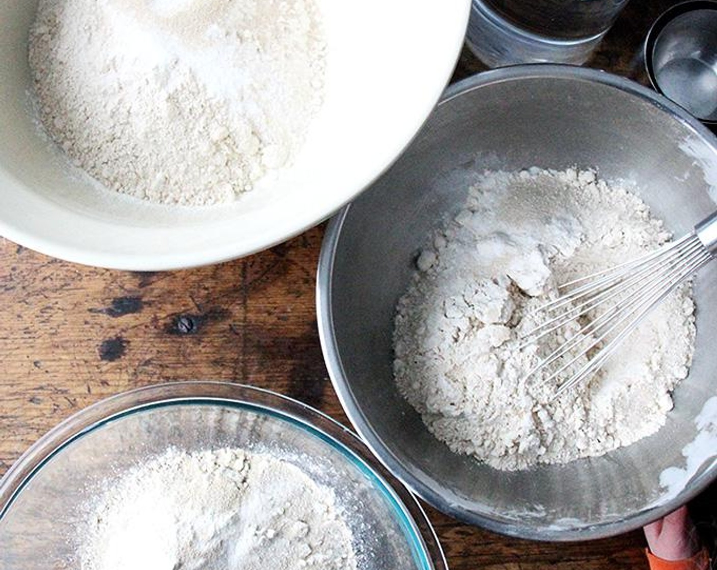 step 1 In a large bowl, whisk together Sprouted Wheat Flour (1 1/2 cups), Unbleached All Purpose Flour (1 1/2 cups), Kosher Salt (1/2 Tbsp), Granulated Sugar (1/2 Tbsp), Instant Dry Yeast (1/2 Tbsp). Add Water (1 1/2 cups) and Neutral Oil (3 Tbsp).