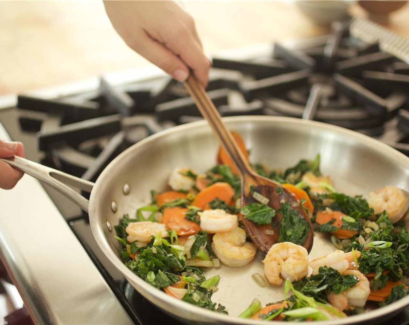 step 8 Return the shrimp to the pan and toss. Add Gluten-Free Hoisin Sauce (2 Tbsp) and Scallions (2 stalks) and stir until well combined. Cook for one minute. Remove from heat.