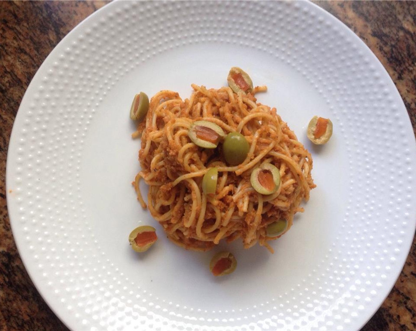 step 9 To serve, top the pasta with the remaining pimento stuffed green olives.