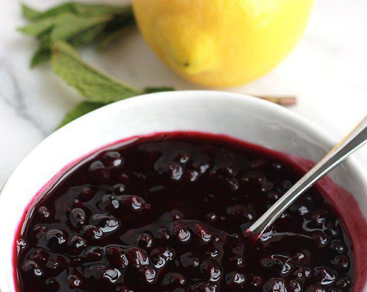 step 1 For the Wild Blueberry Sauce, place Fresh Blueberries (3 cups) and Water (1/2 cup) in a small saucepan over medium-high heat. When berries start to boil, stir in Agave Syrup (4 Tbsp) and reduce to a simmer. Mix Corn Starch (2 tsp) with a little more water until cornstarch is completely dissolved. Stir mixture into berries and continue to simmer an additional 2-3 minutes or until desired consistency is reached. Set aside.