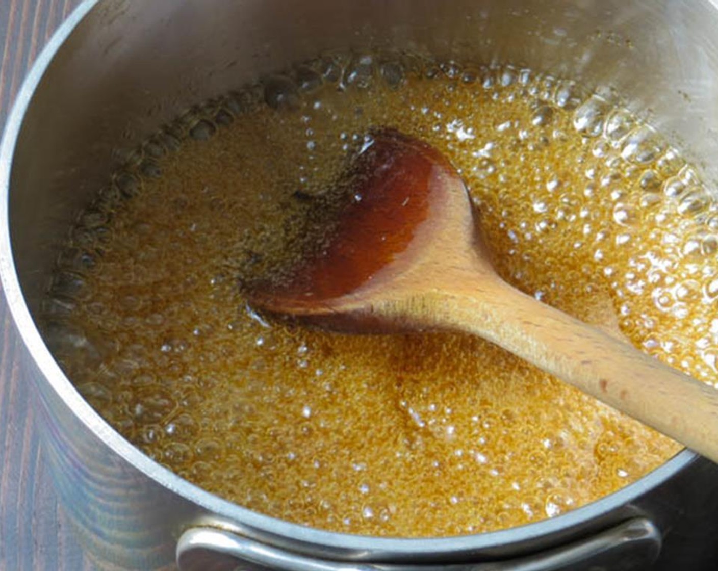 step 3 In a small saucepan, combine the Orange Blossom Honey (1/3 cup), Extra-Virgin Olive Oil (1/3 cup), and Brown Sugar (1/2 cup). Heat over medium high heat, stirring occasionally until mixture comes to a rolling boil and the sugar is dissolved.