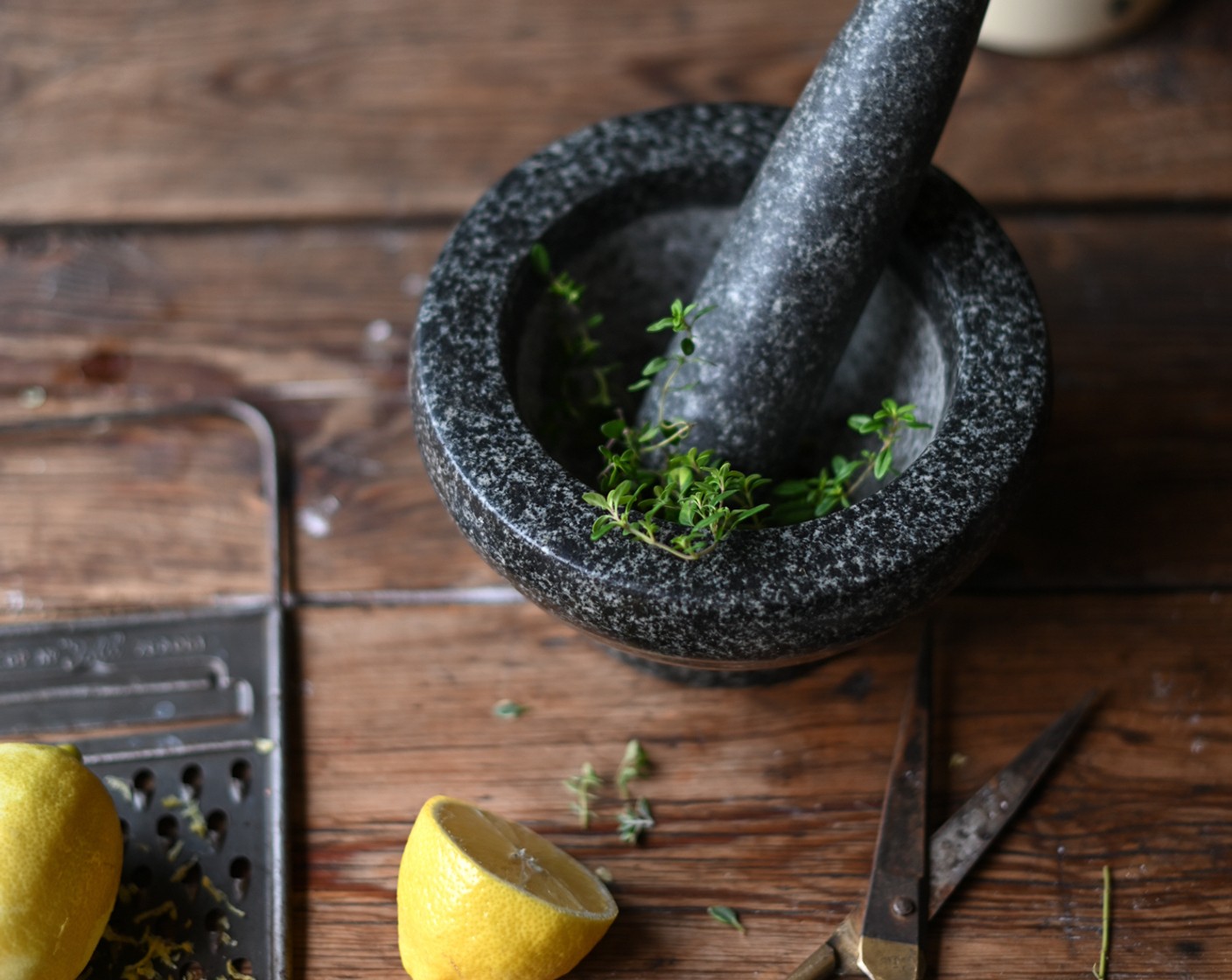 step 4 Use a mortar and pestle to release the oils from the Fresh Lemon Thyme Leaves (1/2 Tbsp) and Lemon (1) and add the mixture to the cake batter. Fold in with a metal spoon.