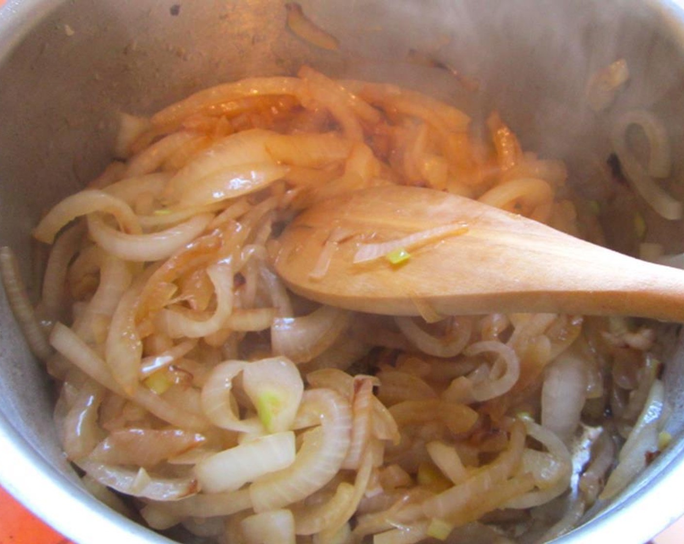 step 8 Sauté sliced Yellow Onions (to taste) in Duck Fat (to taste) with Kosher Salt (to taste) and Freshly Ground Black Pepper (to taste).