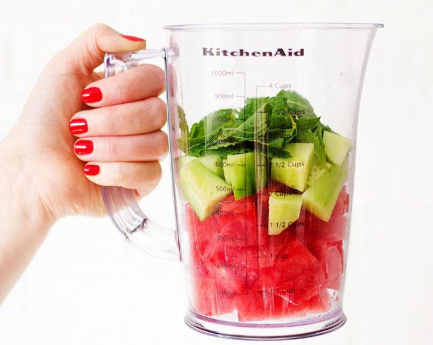 step 1 Add Watermelons (2 cups), Fresh Mint (2 sprigs), and Cucumber (1/2 cup) to a blender.