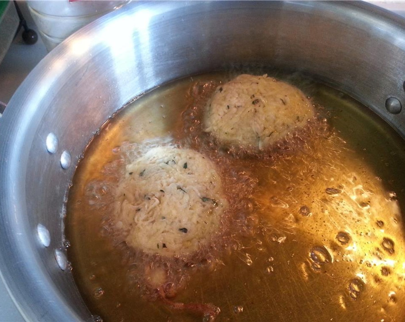 step 6 Get some Canola Oil (as needed) - a half an inch or some-going in a heavy bottomed pan. Form the mixture into 2-inch patties, and when the oil is around 370 degrees F (185 degrees C). Fry them in batches, until golden brown on each side.