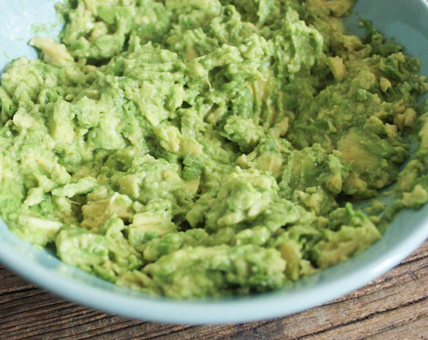 step 4 While the potatoes are baking, prepare the guacamole. In a medium bowl, mash the Avocados (1 1/2) with a fork until almost smooth (a few chunks are okay).