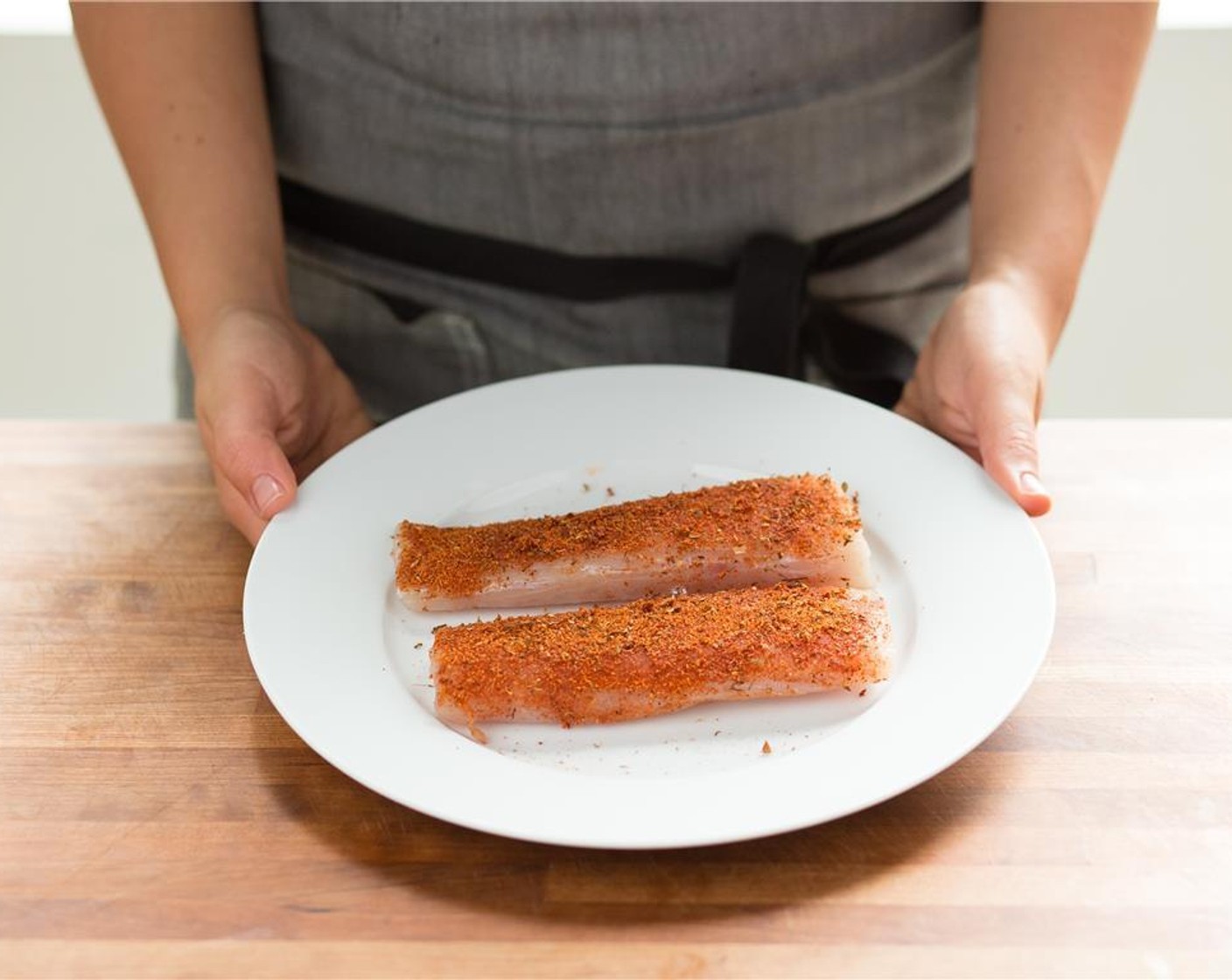 step 5 Pat dry the Mahi-Mahi Fillets (2) with paper towels and rub the Blackening Seasoning (1 Tbsp) onto one side of the fillet, making sure the fillets are well coated. Set aside.