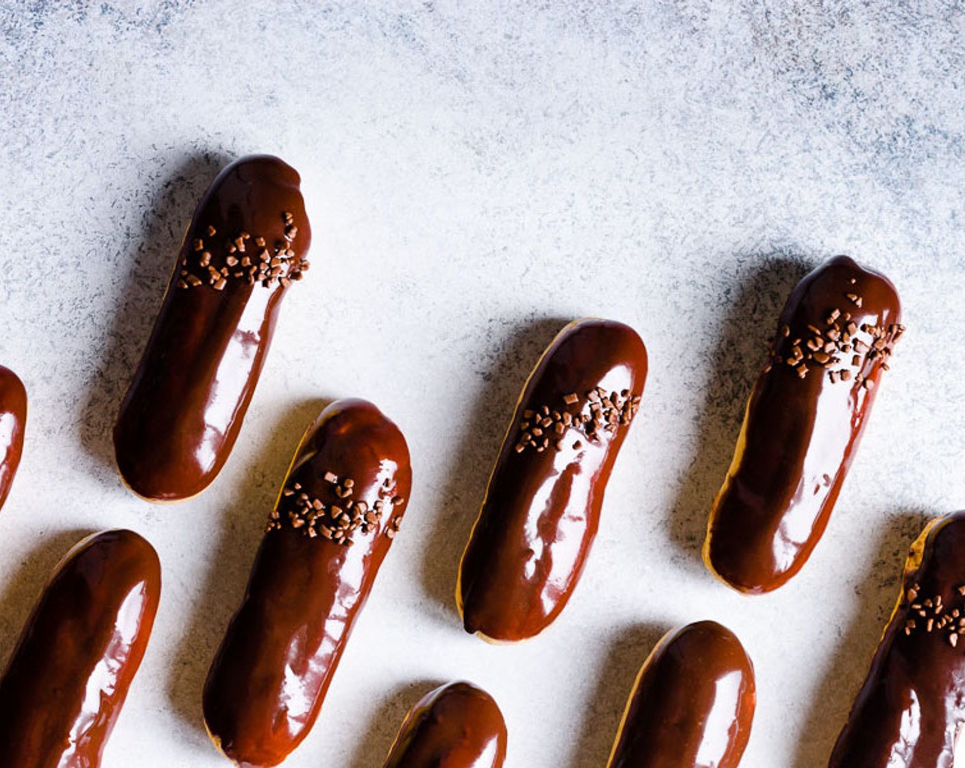 step 23 The chocolate glaze will set in about an hour at room temperature. If not serving right away, refrigerate filled eclairs.