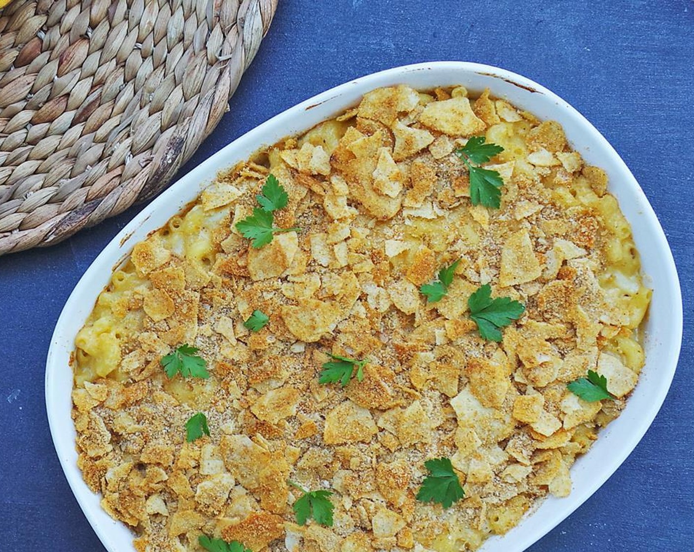 step 8 Mix the plain Breadcrumbs (1/2 cup) and crushed crab chips together. Sprinkle on top of the mac and cheese. Bake for 25 minutes.