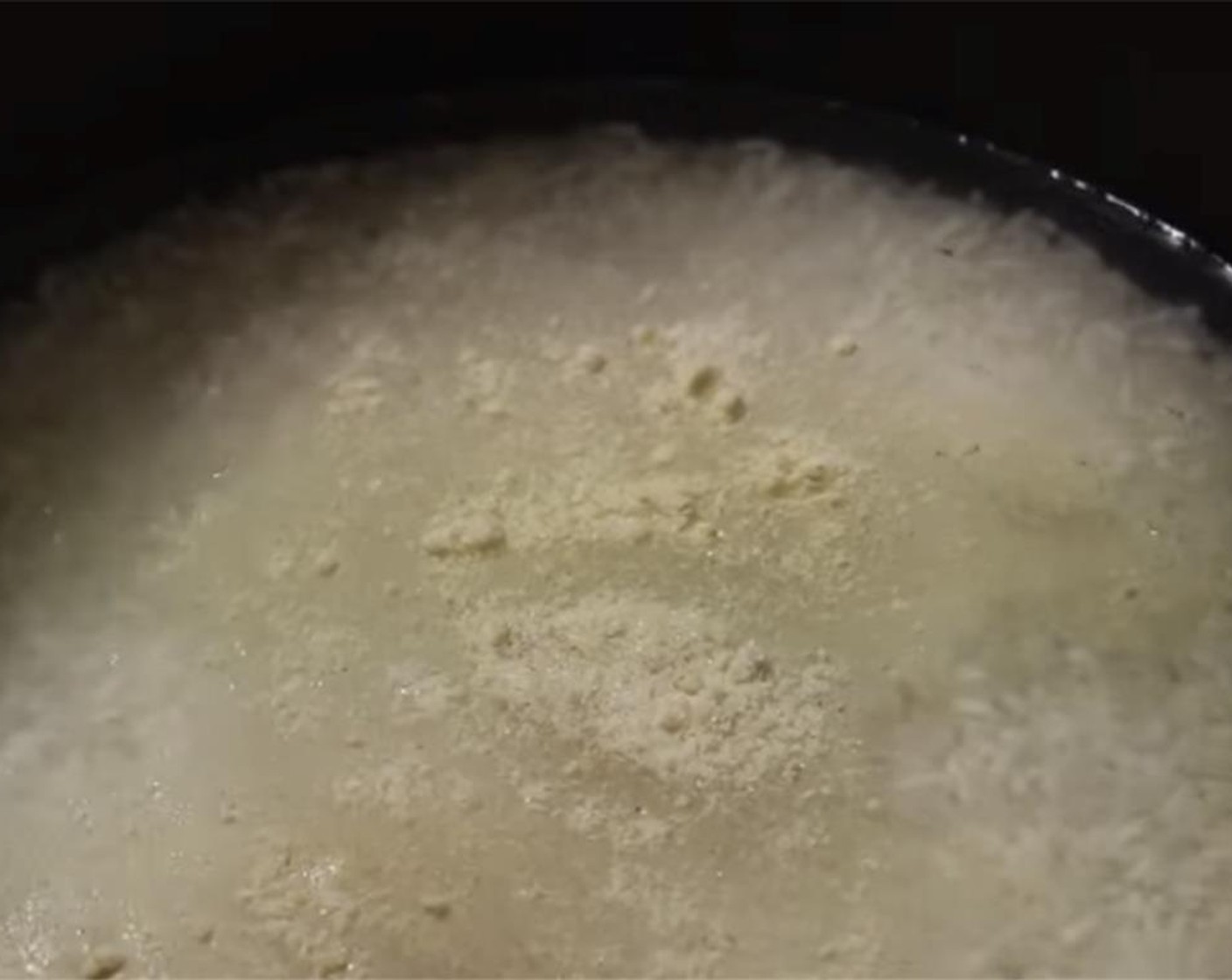 step 3 In a heavy bottom pot, add the rice, seasoning mixture, Water (2 1/2 cups), Oil (2 Tbsp), and Egg Yellow Food Coloring (1/4 tsp).