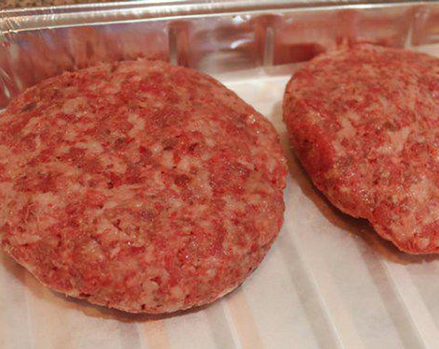 step 2 Place burgers in freezer for 1 hour to firm.
