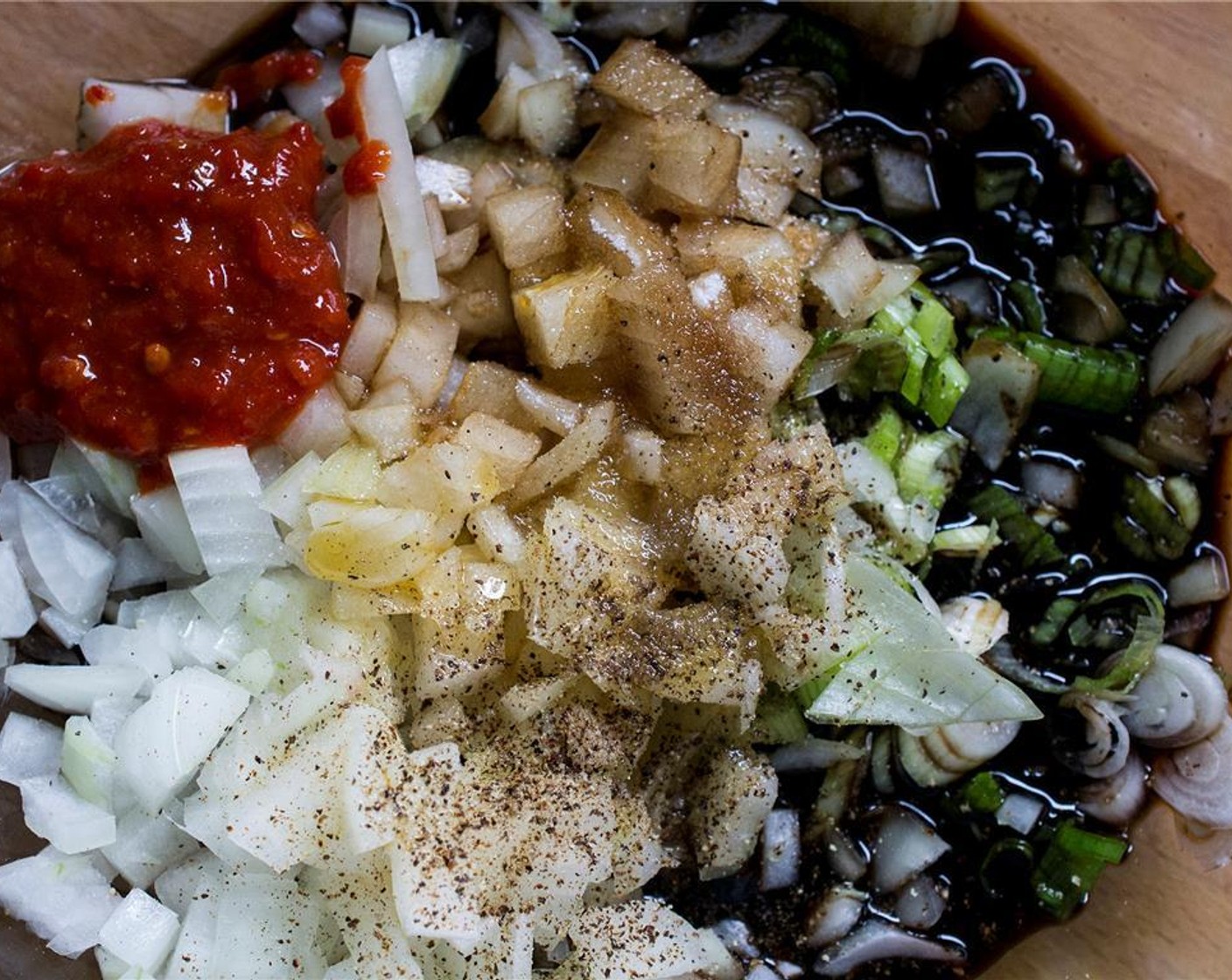 step 7 In a large bowl, combine the Garlic (2 cloves), Yellow Onion (1/2), Pear (1/2), Soy Sauce (2 Tbsp), Sesame Oil (2 Tbsp), Brown Sugar (2 Tbsp), and Gochujang (1 Tbsp).
