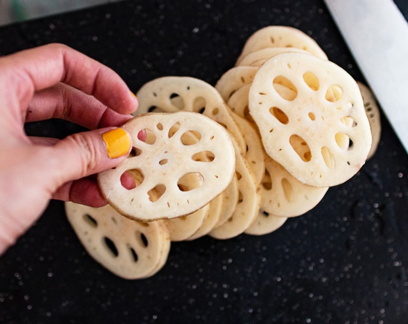 step 1 Wash the Lotus Root (1) and cut it into 2-3mm slices. I don’t peel off the skin as it gives the chips a nice rustic edge once cooked, but it’s up to you.