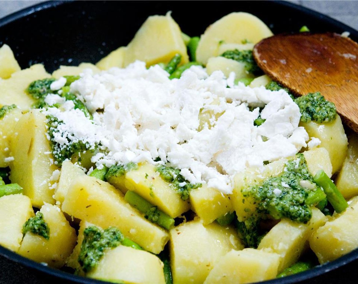 step 4 Add the Sun-Dried Tomatoes (3), Olive Oil (1 Tbsp), the Basil Pesto (2 tsp), Goat Cheese (1/3 cup) and stir well until cheese has melted.