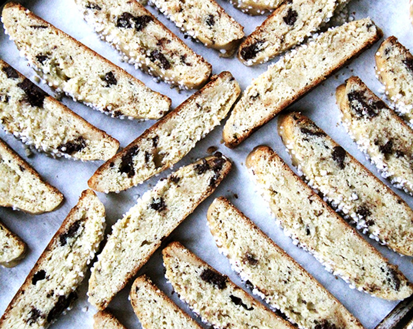 step 9 Let the mandel bread cool slightly and then use a sharp serrated knife to cut crosswise into 1-inch thick slices. Turn the slices on their sides and bake for 20 more minutes, or until desired crispness.