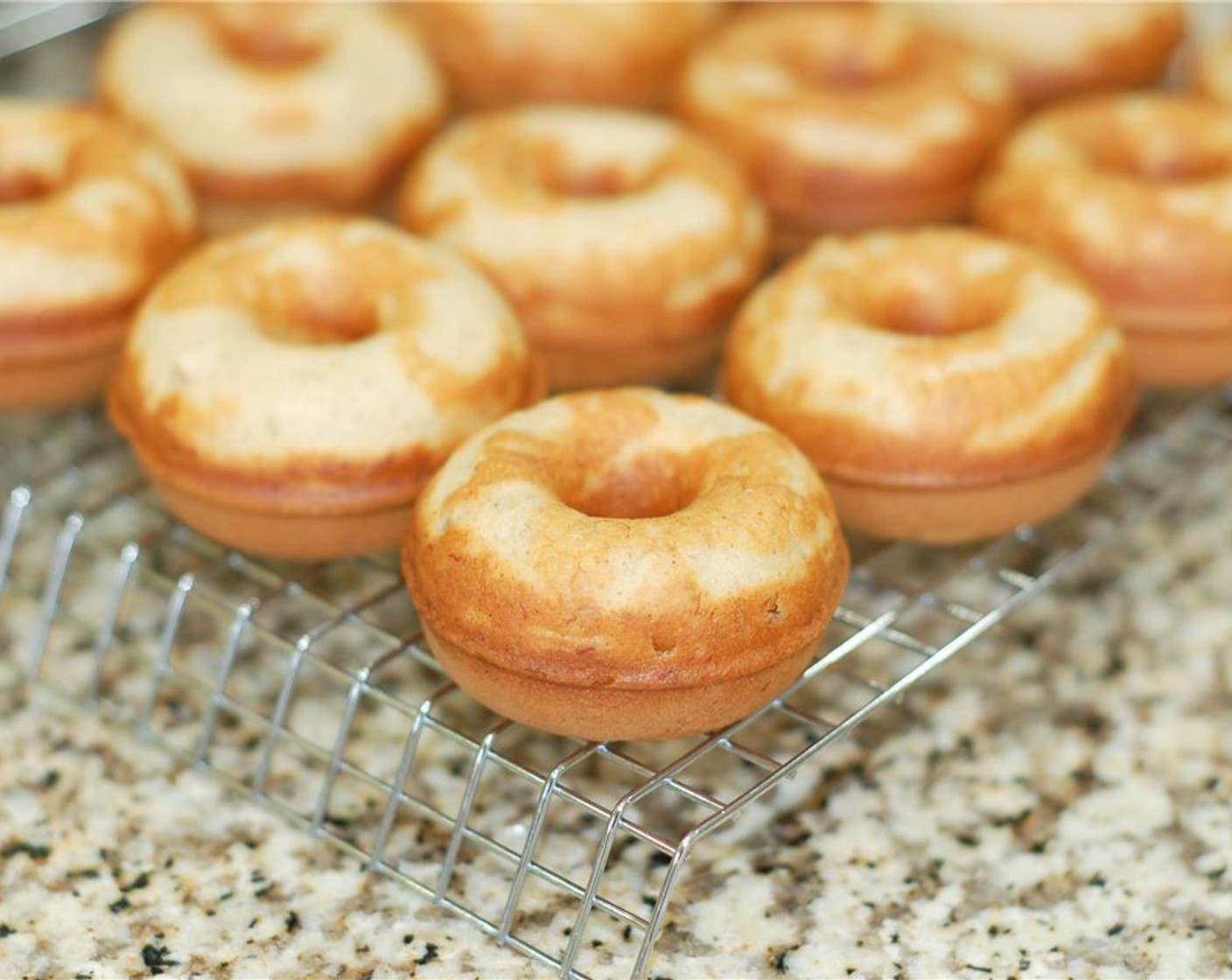 step 9 Place hot donuts on cooling rack with a wax paper underneath for when you are ready to glaze.