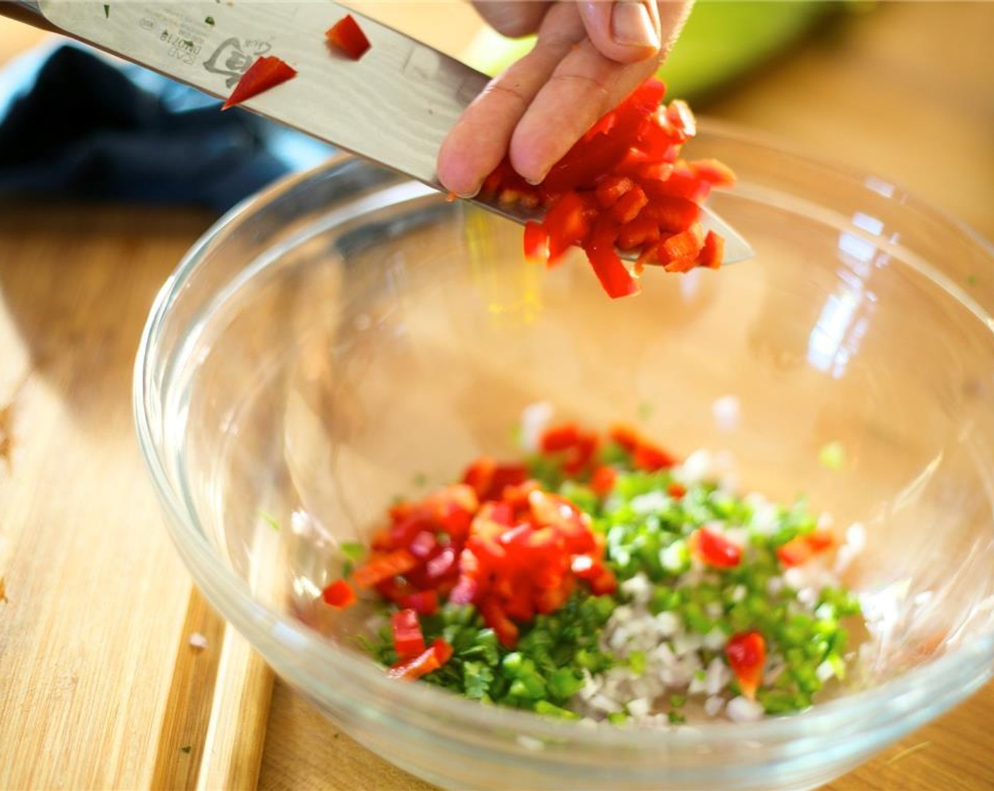 step 10 Meanwhile, slice Red Bell Pepper (1/2) in half and remove the stem, seeds, and inner pith. Slice lengthwise into quarter inch pieces and then slice again to create quarter inch square pieces. Add to bowl with shallot.